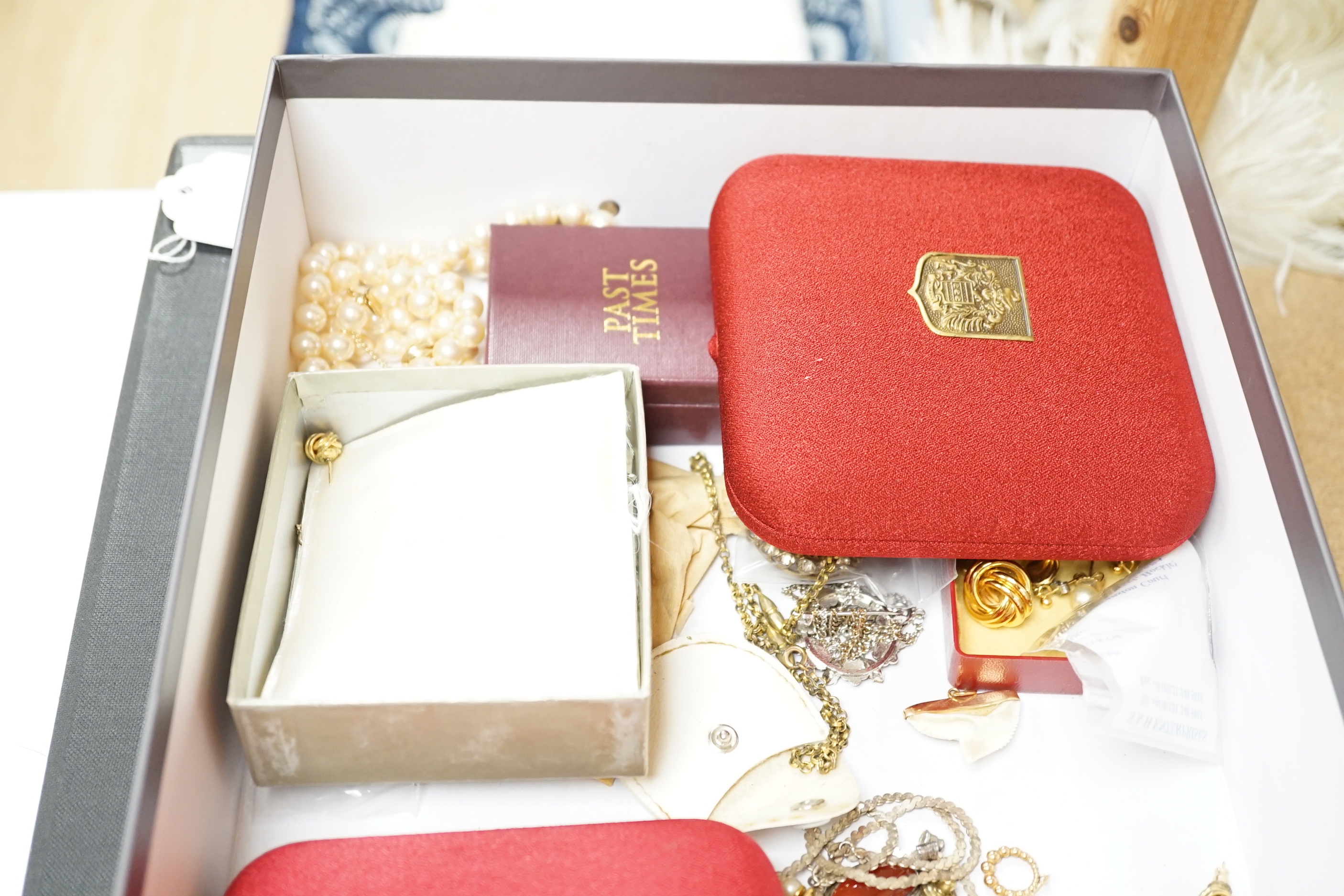 A quantity of assorted jewellery including costume, silver hinged bangle, etc.